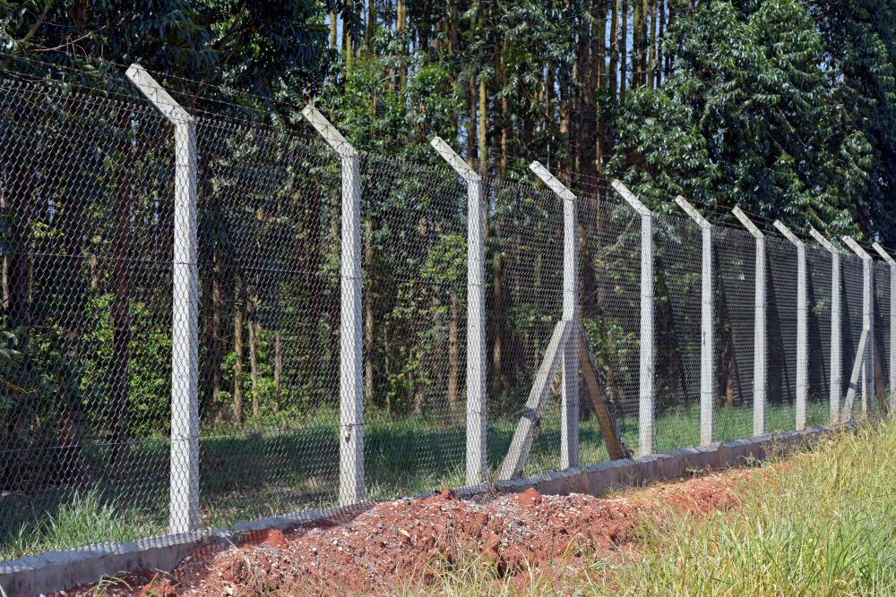 The Best Way to Set Fence Posts in Concrete
