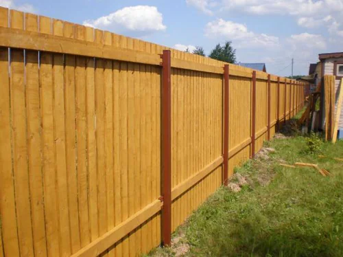 Stockade Fence installed by Wulff Fence
