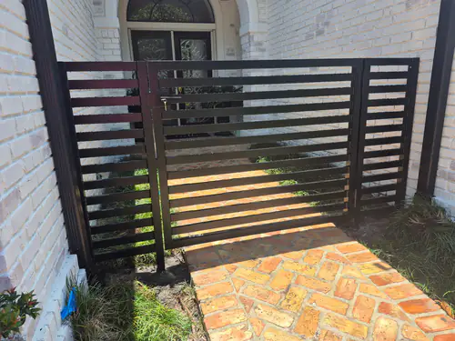 Aluminum front walkway gate at a Flagler Beach home