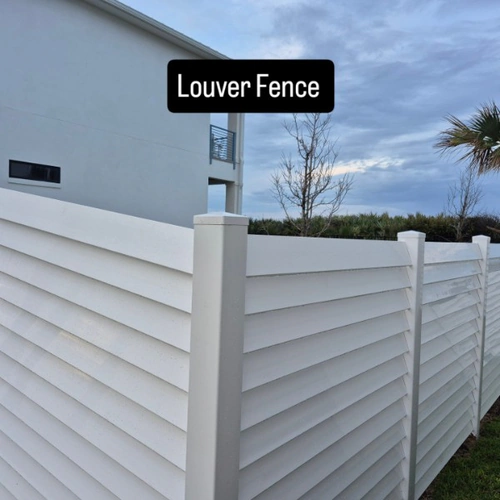Vinyl louver style privacy fence installation in Orlando