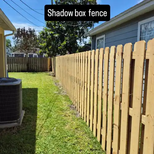 Wood Shadow Box Fence at a Yellow House in Orlando