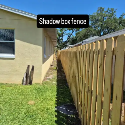 Wood Shadow Box Fence at a Yellow House in Orlando