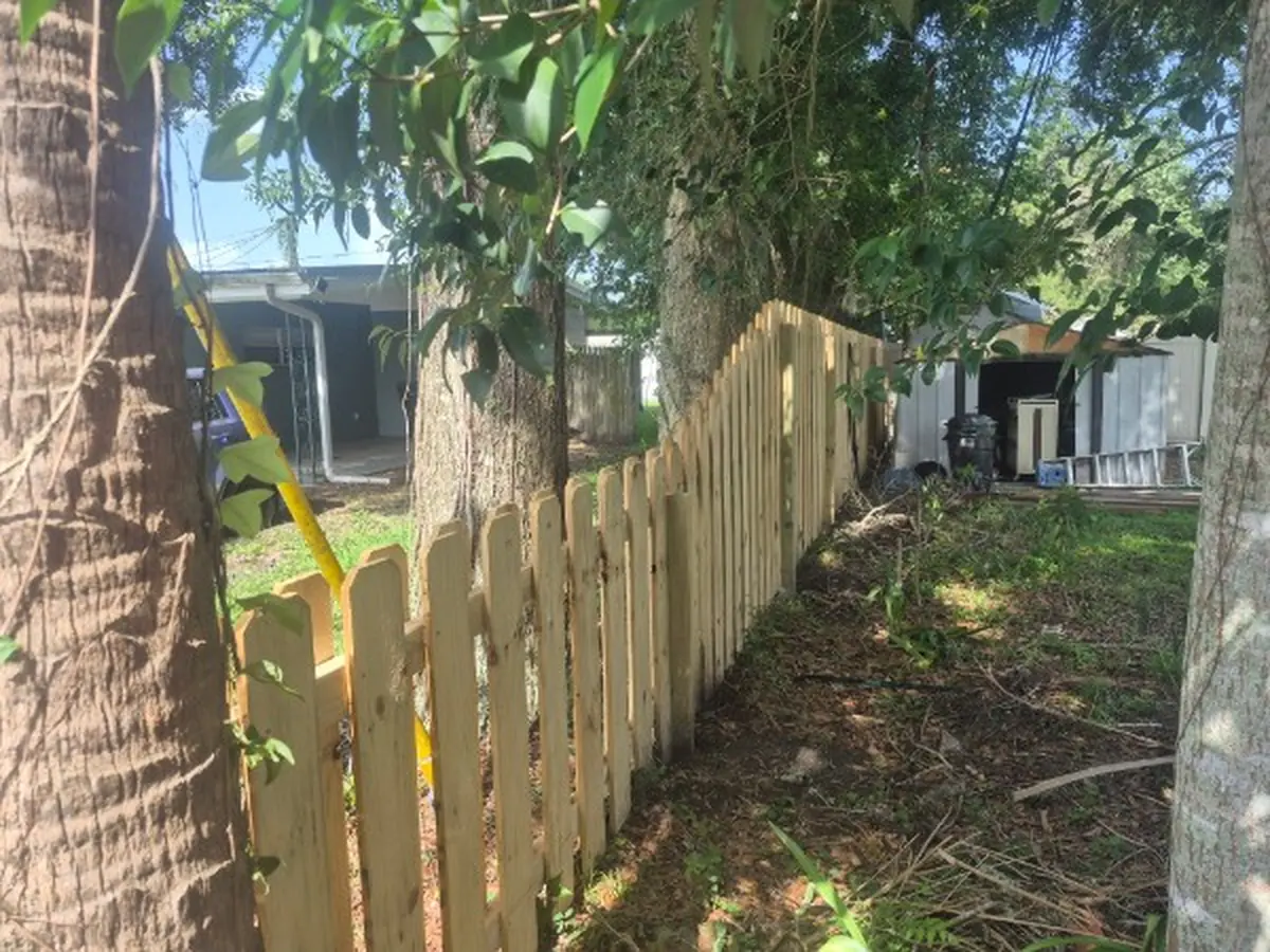Wood Shadow Box Fence Installation in Flagler Beach